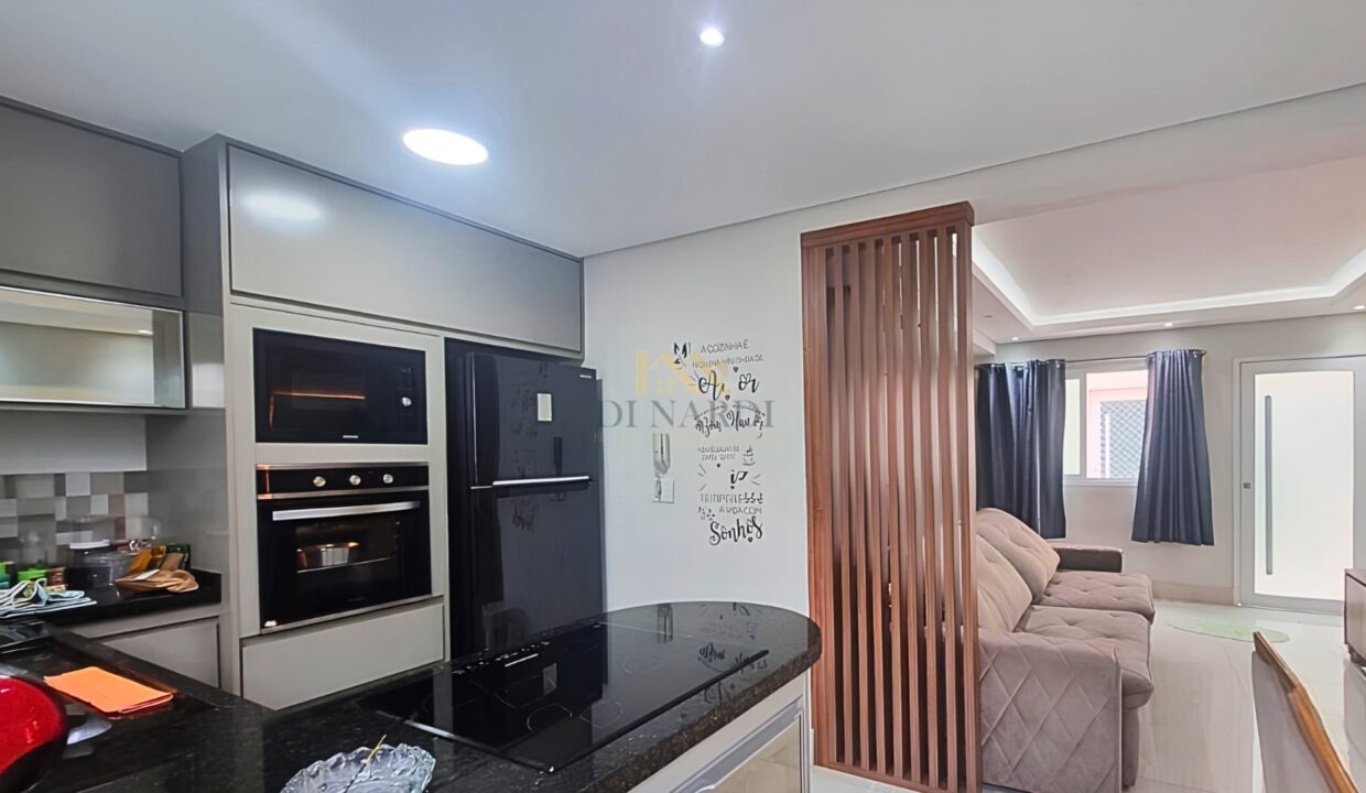 cozinha-americana-planejada-com-cooktop-e-coifa